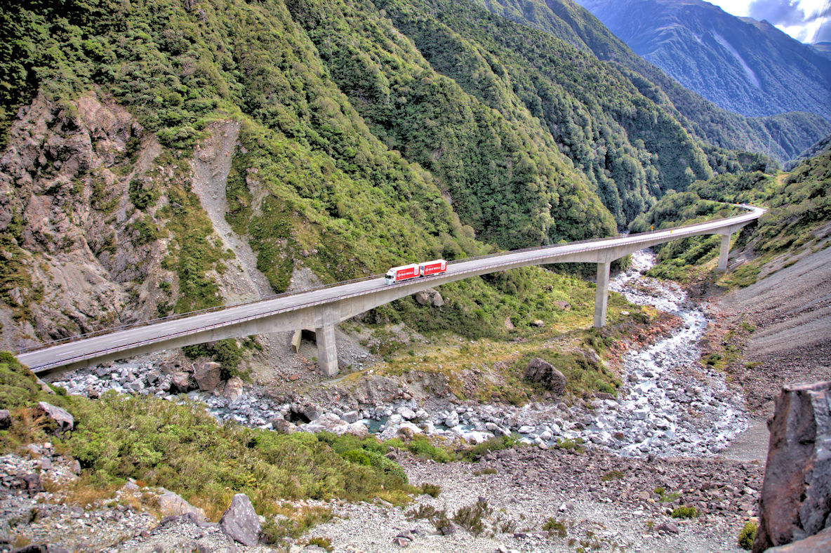 A truck grinds its way up the Otira Viaduct on the West Coast Rd - Arthurs Pass